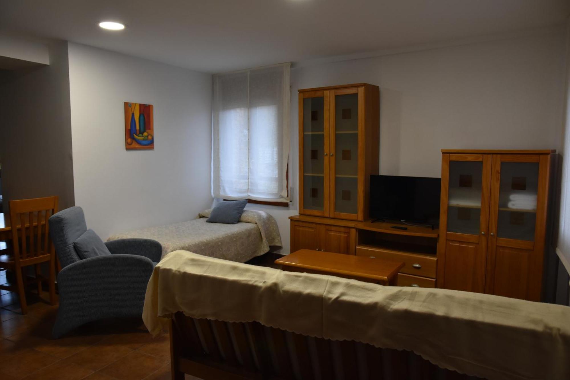 Aparthotel Tres Caminos El Grado Esterno foto