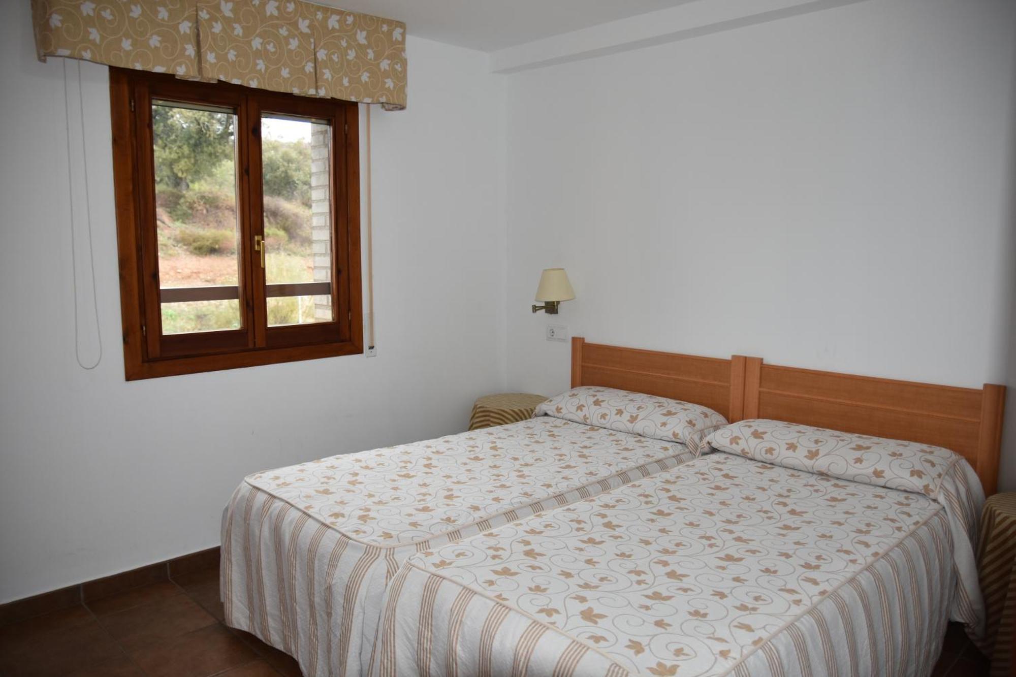Aparthotel Tres Caminos El Grado Esterno foto
